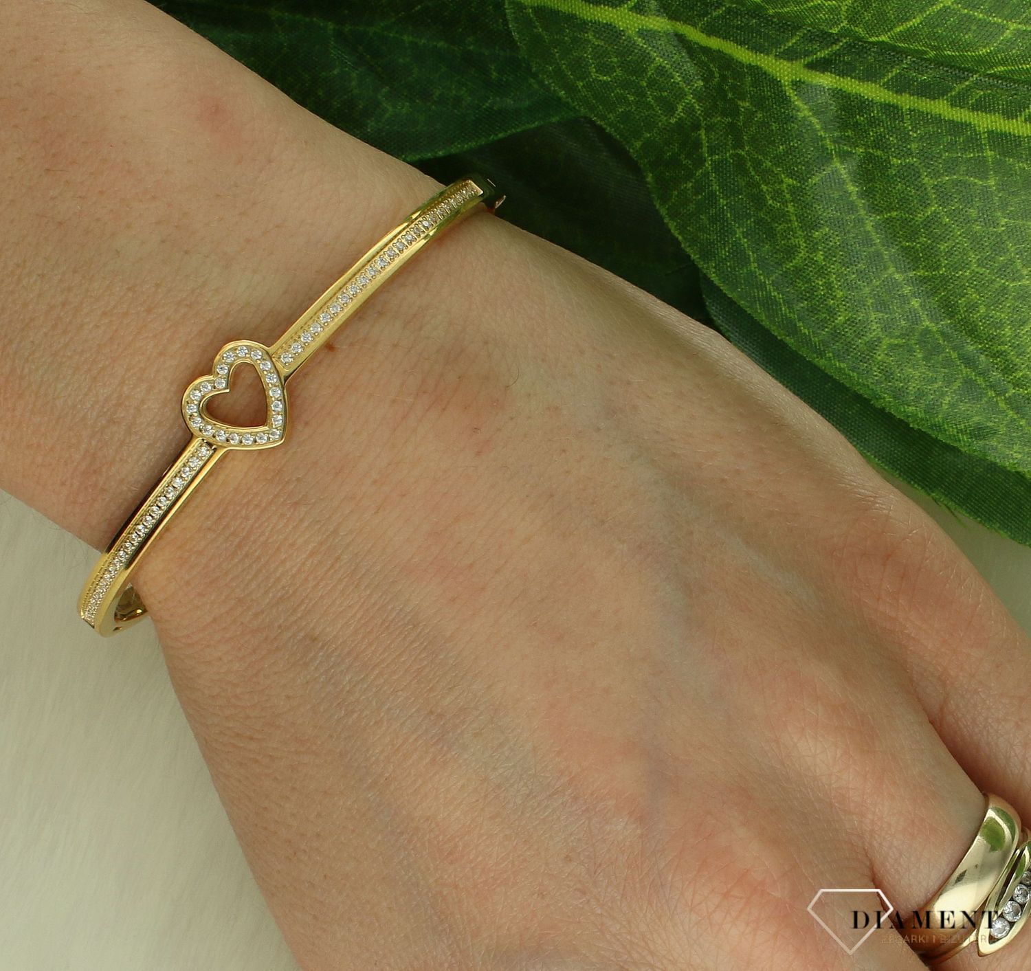 Bransoletka damska złota sztywna z sercem i cyrkoniami Nomination 029501 006.jpg